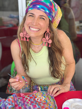 Sara Joy at the FAENA HOTEL hand painting her merchandise as a collaboration with the hotel.