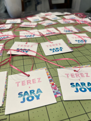Terez x Sara Joy tags.