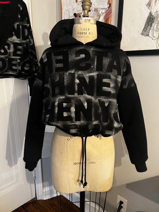 Sara Joy x Shapero custom painted sweatshirt.