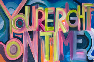 You're Right On Time painting created by New York artist, Sara Joy. Blue background with colorful (pinks, purples, yellows) letters spelling, "You're Right On Time."