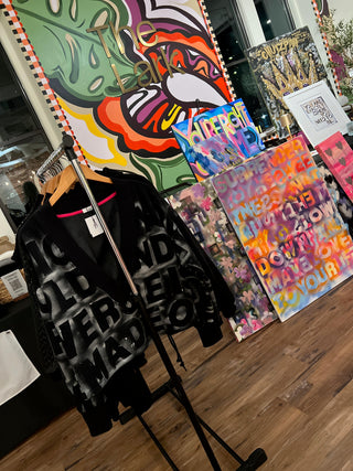 Sara Joy's custom sweatshirts and custom abstract paintings.